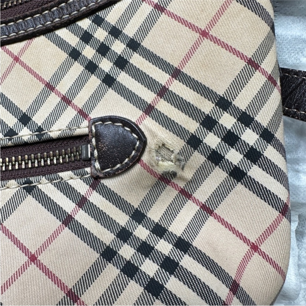 Authentic Burberry Shoulder Bag
Classic Nova check beautiful but has Flaws! - Picture 2 of 8